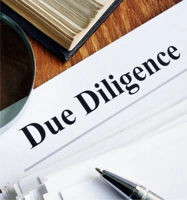 due diligence écrit sur une feuille